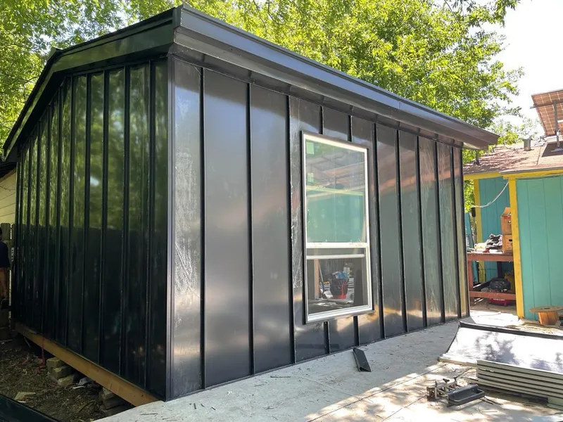 Black standing seam metal wall panels for Roof Inspection in Country Club